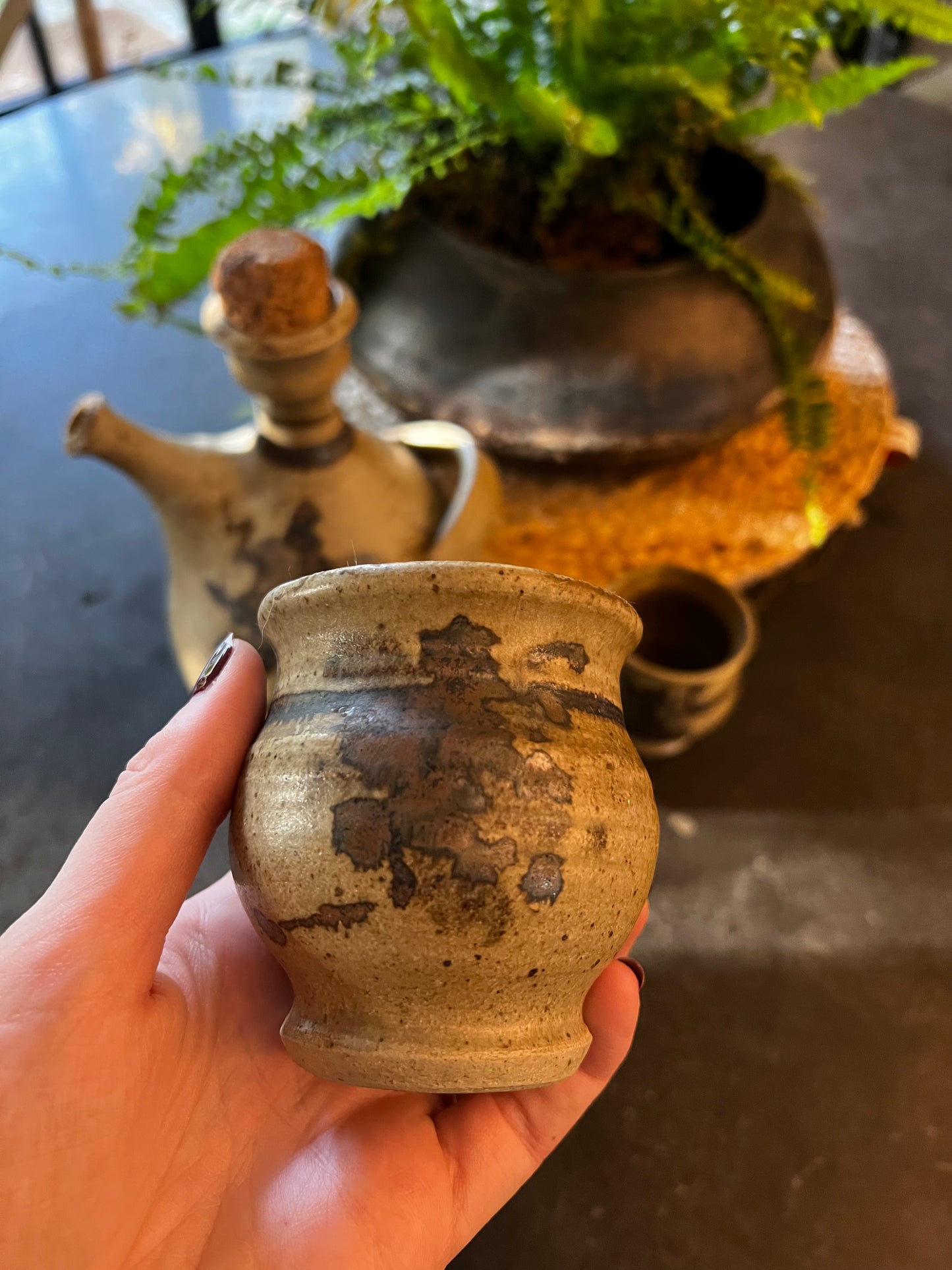 Stoneware carafe and drinking cups