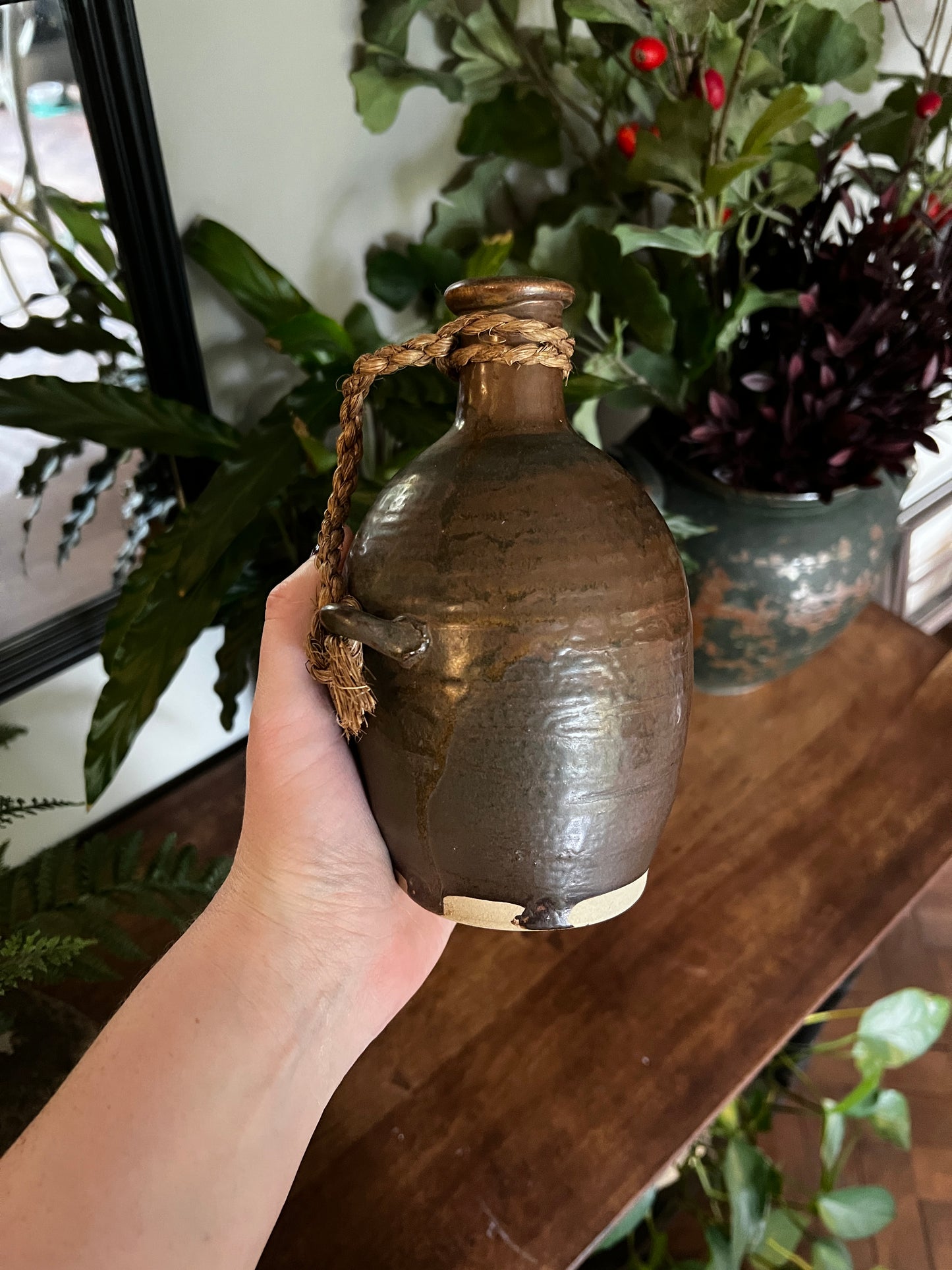 Rustic glazed vessel with twine handle