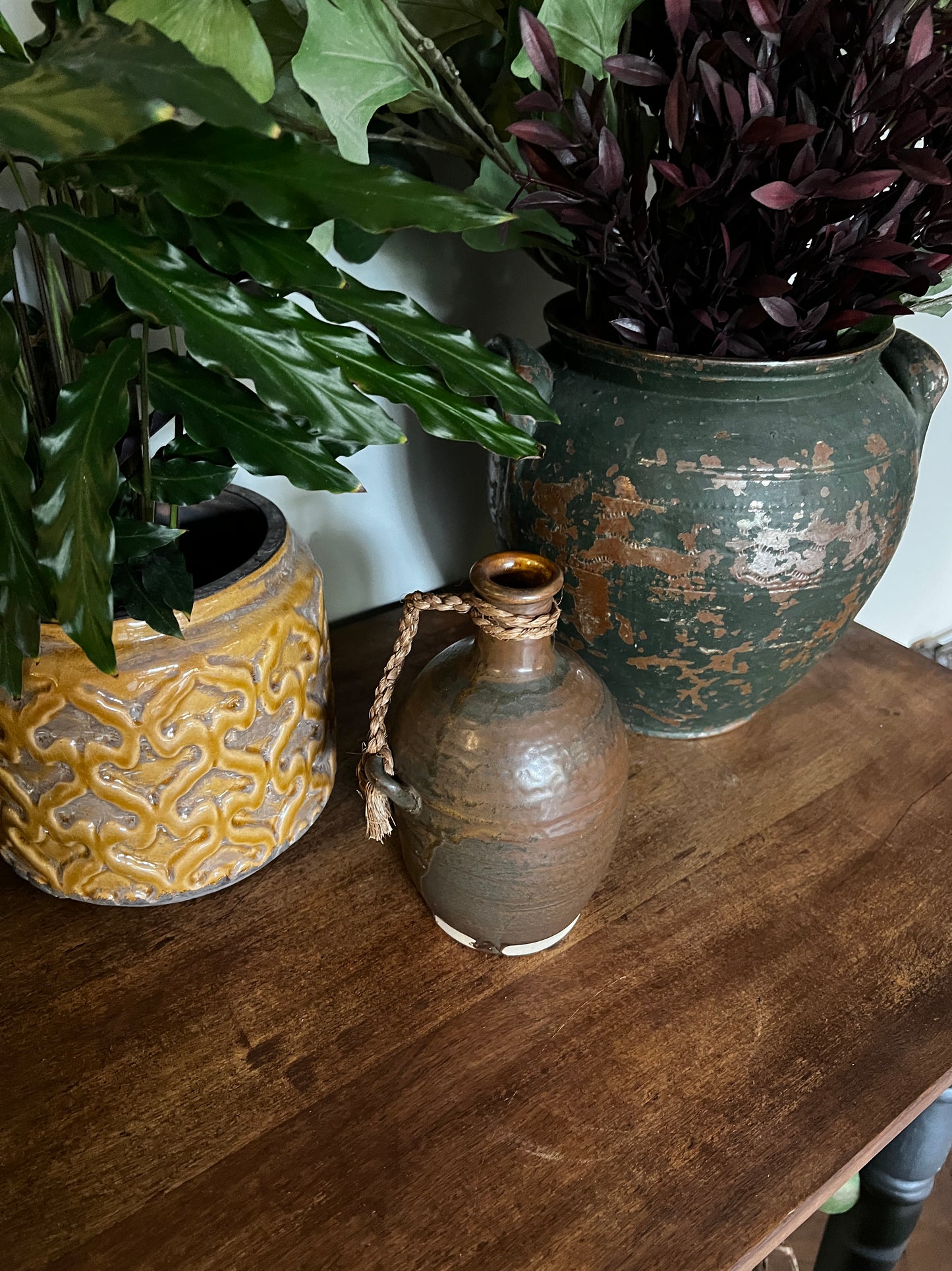 Rustic glazed vessel with twine handle