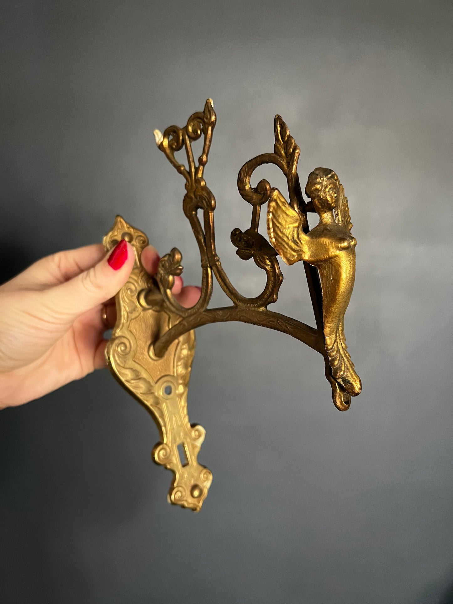 Ornate brass bracket