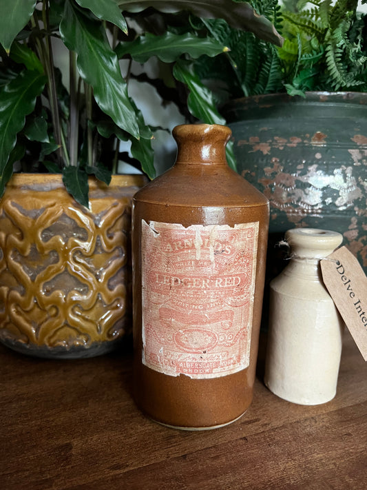 Stoneware ink bottle with vintage label