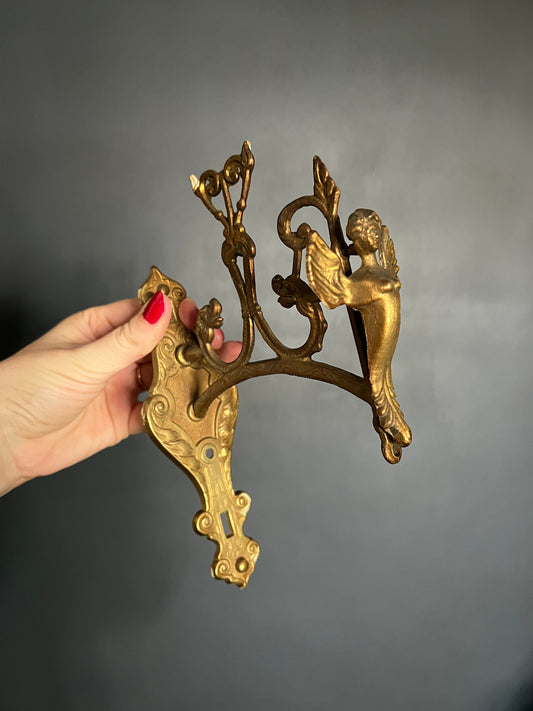 Ornate brass bracket