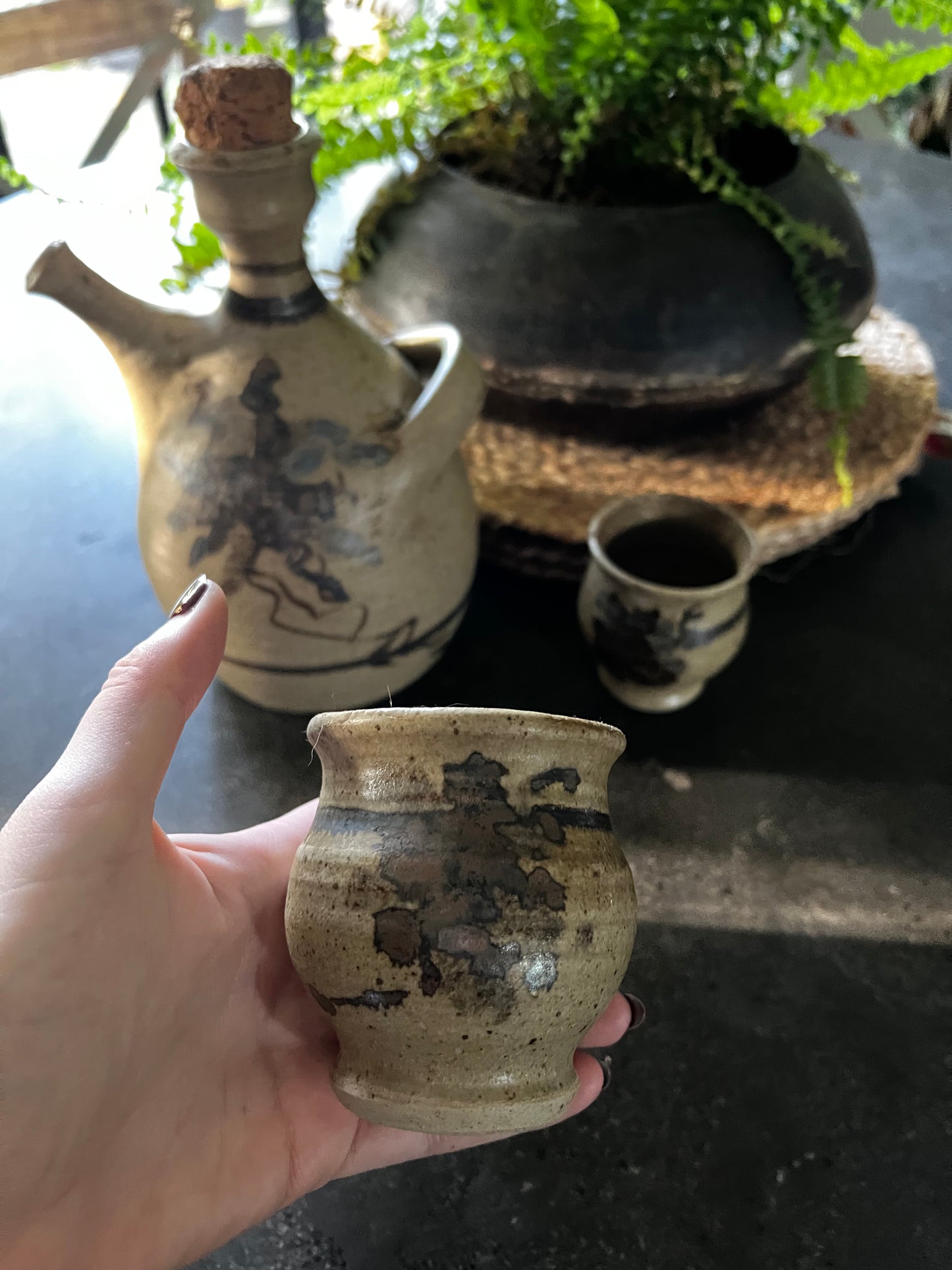 Stoneware carafe and drinking cups